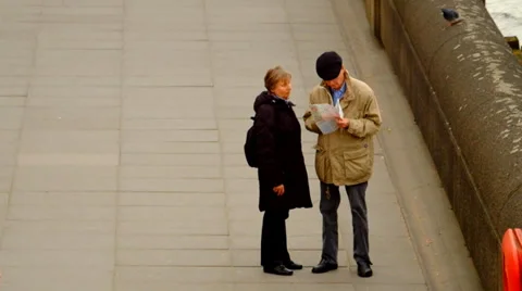 Tourists reading a map in London Stock Footage 36596957