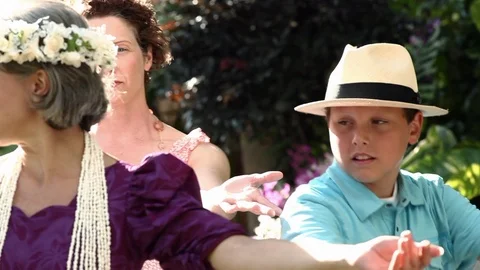 Tourists receiving a dance lesson. 스톡 동영상 88368410