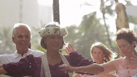 Tourists receiving a dance lesson in the rain. 스톡 동영상 88368355