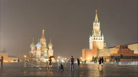 Tourists on red square at night, in the rain, photo shoot, timelapse Stock Footage 62444480