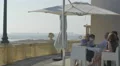 Tourists relaxing at a cafe on the beach, Porto 4k or 4k+ Resolution