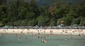 Tourists rest on beach, People Swimming, Tanning, Playing, Water Sports HD Footage