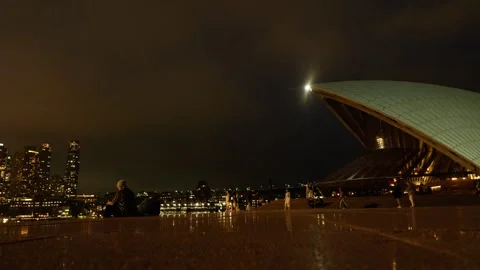 Tourists rest on the steps of Sydney Opera House in the evening 6K Video stock 301164534