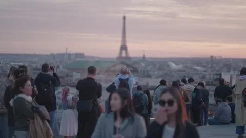 Tourists rooftop Galeries Lafayette Haussmann sunset Eiffel Tower Paris, France Stock Footage 275864341