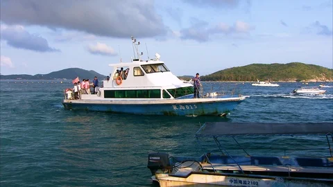 Tourists sailing in boat Stock Footage 88931404