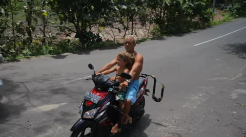 TOURISTS ON SCOOTER Stock Footage 27330673