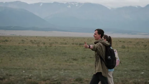 Tourists on the side of the road in the mountains. Stock Footage 280814600