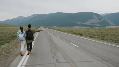 Tourists on the side of the road in the mountains. Stock Footage 280814734