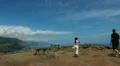 Tourists sightseeing at coastline 20110427 122110a HD Footage