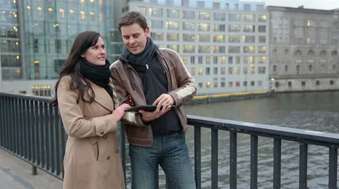 Tourists on sightseeing trip with tablet pc Stock Footage 33402954