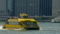 Tourists sightseeing by Water Taxi in East River Manhattan New York City NYC 4k or 4k+ Resolution