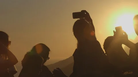 Tourists silhouettes at sunset Video stock 109019843