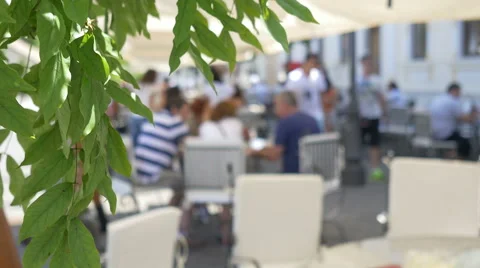 Tourists Sit on Terraces Stock Footage 53840894
