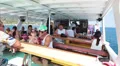 Tourists sitting under sun roof in recreational marine boat, Cyprus HD Footage