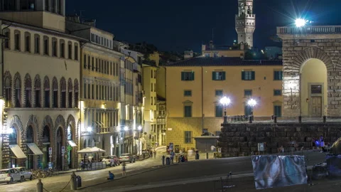 Tourists on a sloping square Piazza Pitti before the Palace Pitti at night Vídeos de archivo 234724355