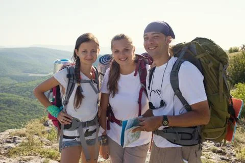 Tourists smiling on the camera Stock Photos