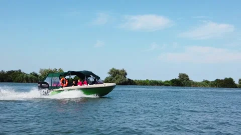 Tourists in speed boat on the river Stock Footage 202205569