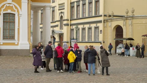 Tourists on the square in front of the Peter and Paul Cathedral. Stock Footage 205891065