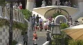 Tourists on the stairs at the main entrance to Park Guell, Barcelona 4k or 4k+ Resolution