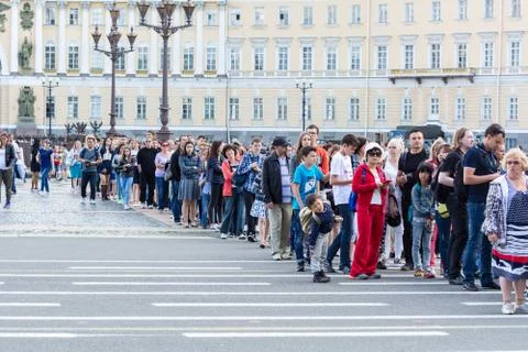 Tourists stand in queue long hours in the State Hermitage Museum, St. Peter.. Stock Photos