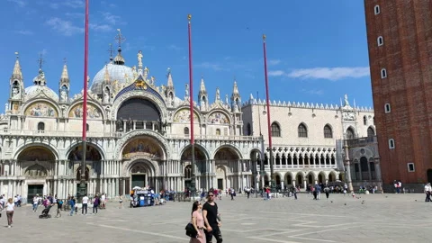 Tourists start visiting St. Mark's Square again after the coronavirus pandemic Stock Footage 132290931