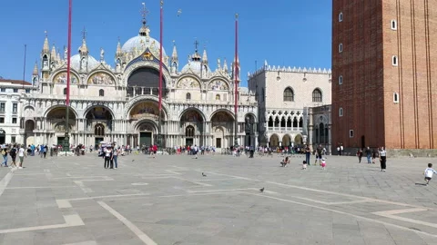 Tourists start visiting St. Mark's Square again after the coronavirus pandemic Stock Footage 132293350