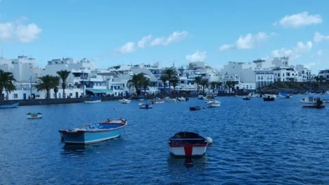 Tourists stroll around Arrecife de Lanzarote Video stock 257820180