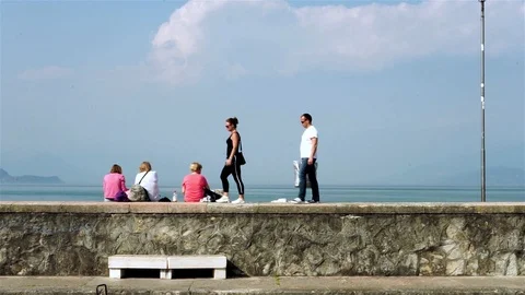 Tourists stroll on the pier Stock Footage 107907983