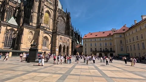 Tourists Strolling Around Prague Castle and St. Vitus Cathedral on a Sunny Day Stock Footage 346965170