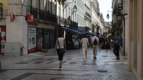 Tourists strolling down Rua da Prata in Baixa Lisbon, Portugal Stock Footage 95797124