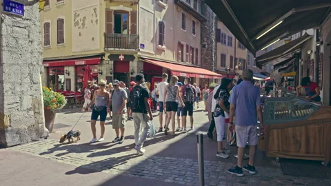 Tourists strolling through the center of the ancient city of Annecy Stock Footage 160573229