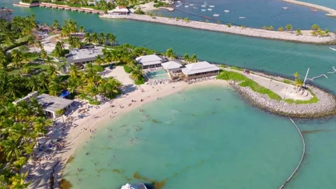 Tourists Swimming At Api Beach In The Cap Cana Marina, Dominican Republic. - Stock Footage 327787881