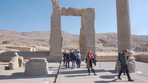 Tourists taking pictures of the Gate of All Nations, Persepolis Stock Footage 100697244