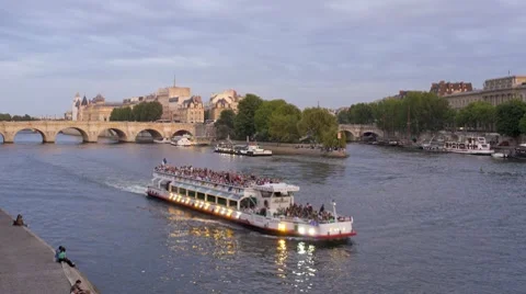 Tourists taking pleasure trips on the River Seine Paris in natural and Stock Footage 7727181