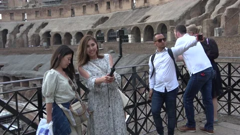 Tourists Taking Selfies Inside The Colosseum In Rome, Italy Stock Footage 154962275