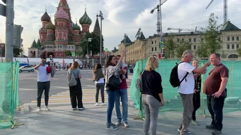 Tourists taking selfies with St basil cathedral on the background Stock Footage 146947310