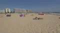 Tourists tanning on the beach, Porto 4k or 4k+ Resolution