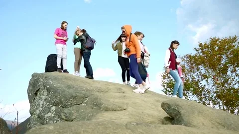 Tourists on top of the mountain Stock Footage 77705833