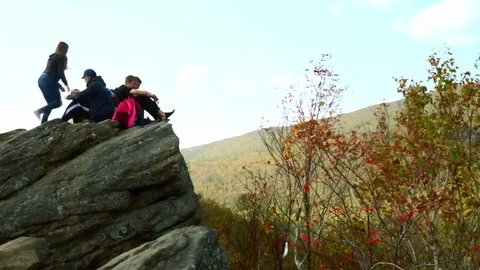Tourists on top of the mountain  Stock Footage 77705983