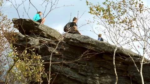 Tourists on top of the mountain  Stock Footage 77706043