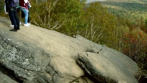 Tourists on top of the mountain  Stock Footage 77706070