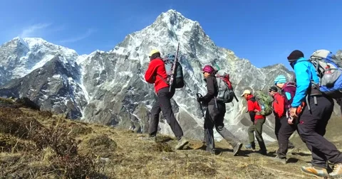 Tourists on the track to the base camp of Mount Everest. Stock Footage