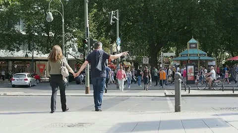 Tourists at traffic lights in Kurfuerstendamm shopping street in Berlin, Germany Stock Footage