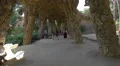 Tourists under the stone columns arcade in Park Guell, Barcelona 4k or 4k+ Resolution