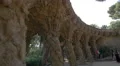 Tourists under the stone columns arcade in Park Guell, Barcelona 4k or 4k+ Resolution