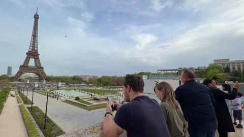 Tourists viewing Eiffel Tower from Trocadero in Paris Stock Footage 334118748