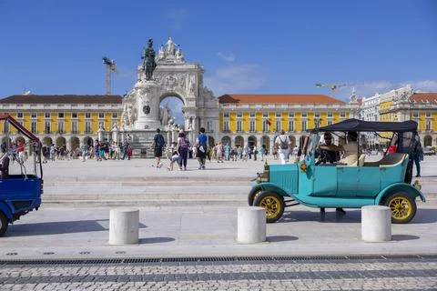 Tourists visit the Commerce Square (Praca do Comercio) in Lisbon, Portugal Stock Photos