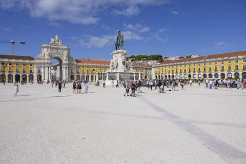 Tourists visit the Commerce Square (Praca do Comercio) in Lisbon, Portugal Stock Photos