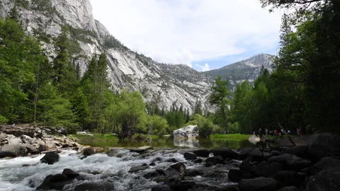 Tourists visit Mirror Lake below El Capitan Stock Footage 319594833