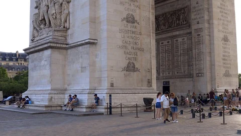 Tourists visiting the Arc de Triomphe on the Place de l'Etoile square in Paris Stock Footage 127632862